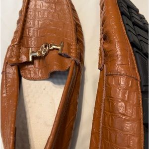 Men’s snakeskin shoes.